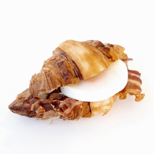 Vaniye croissant with soft poached eggs and pancetta